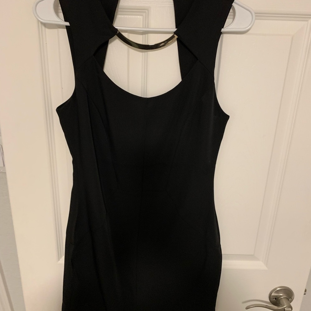 Gorgeous classy black dress . Bebe size 4